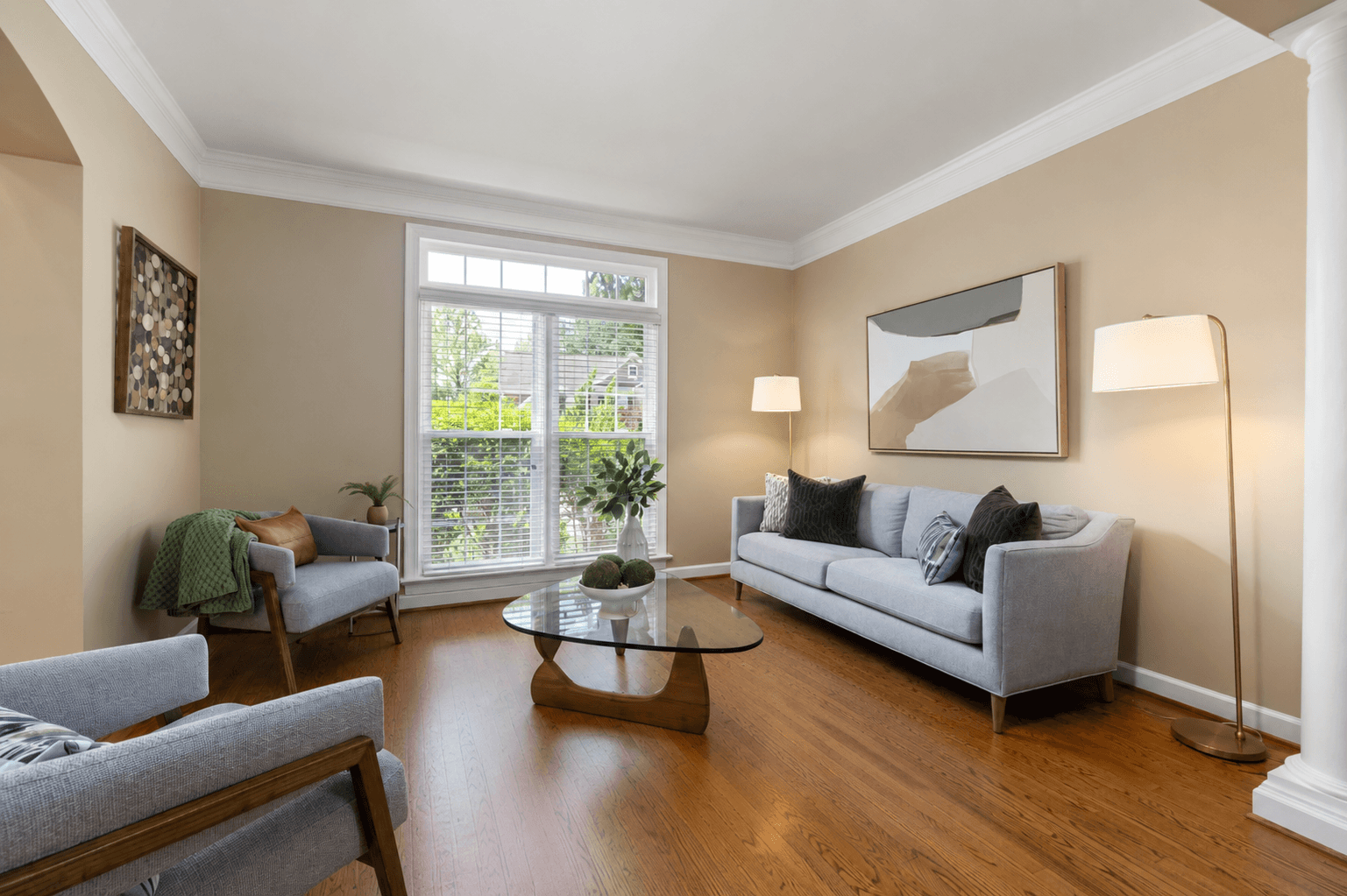 A bright living room shown with dark oak
